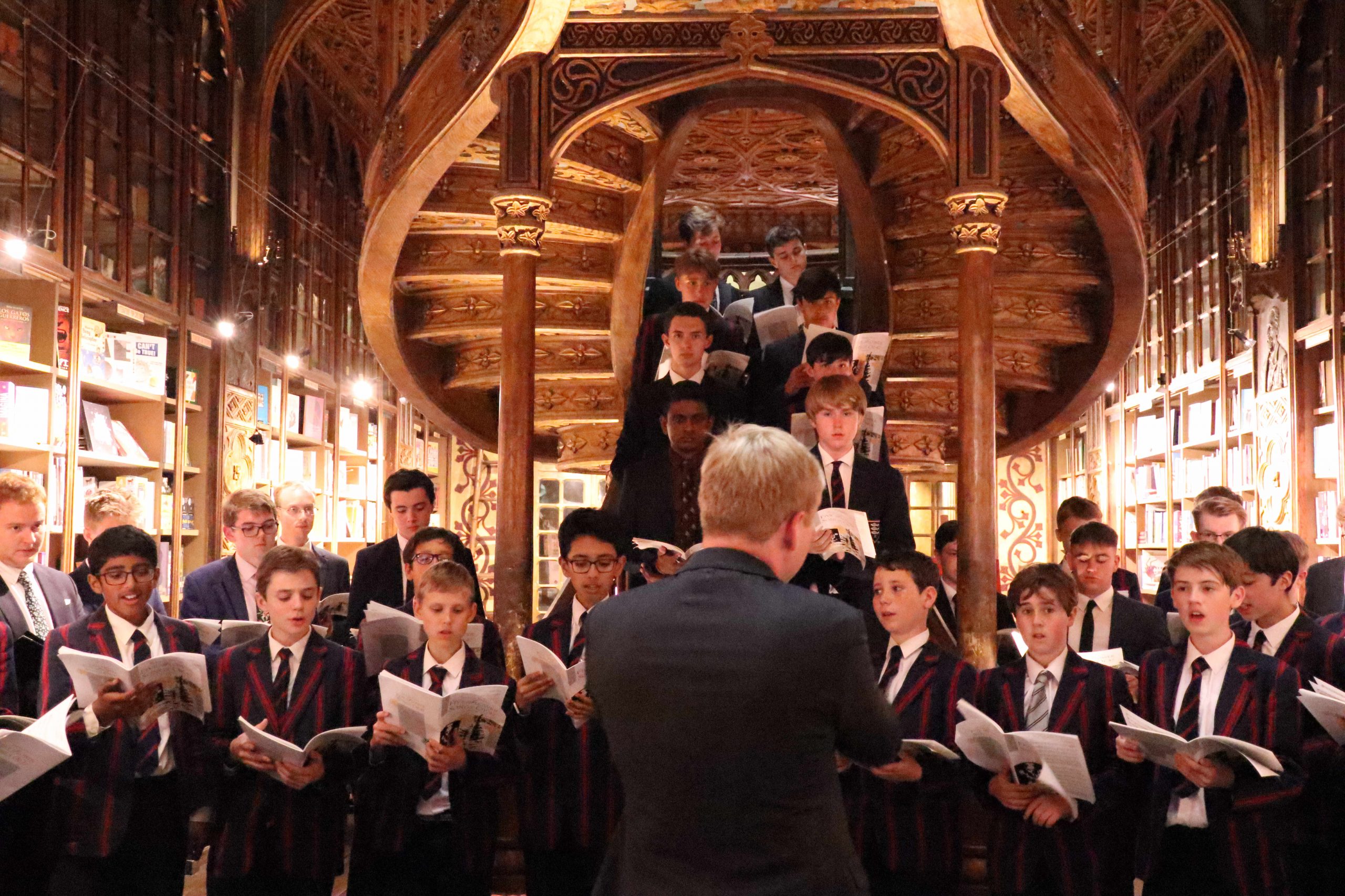 Choir perform in decorative Portuguese book store